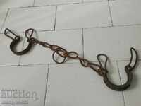 Old hand-forged buckles, chains, shackles, shackles