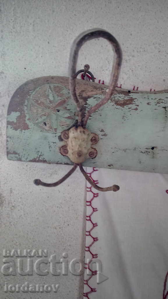 An old wooden hanger. - 5 An old wooden hanger. - 5