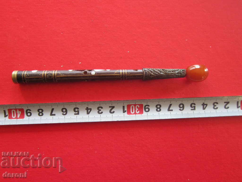 A great old cigarette with amber and filigree with price 70.20 BGN | € 35.89 A great old cigarette with amber and filigree with price 70.20 BGN | € 35.89