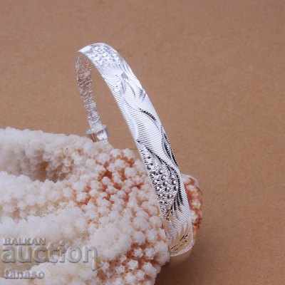 Licitație Brățară argintie cu ornamente – manufactură italiană – elegantă