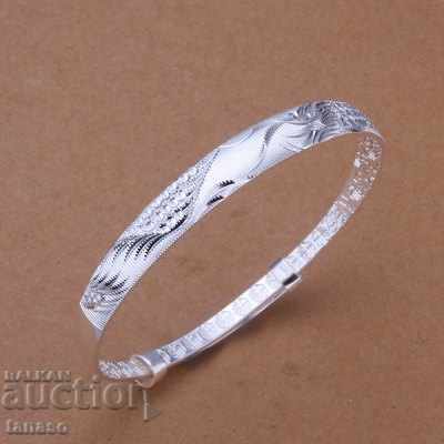 Stylish lady's hand, silver plated