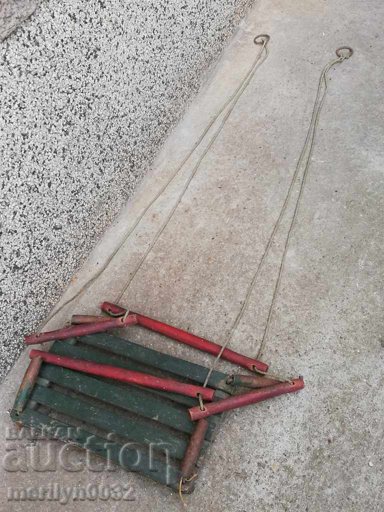 Delivery of Old child swing primitive with the original wooden dyes Delivery of Old child swing primitive with the original wooden dyes