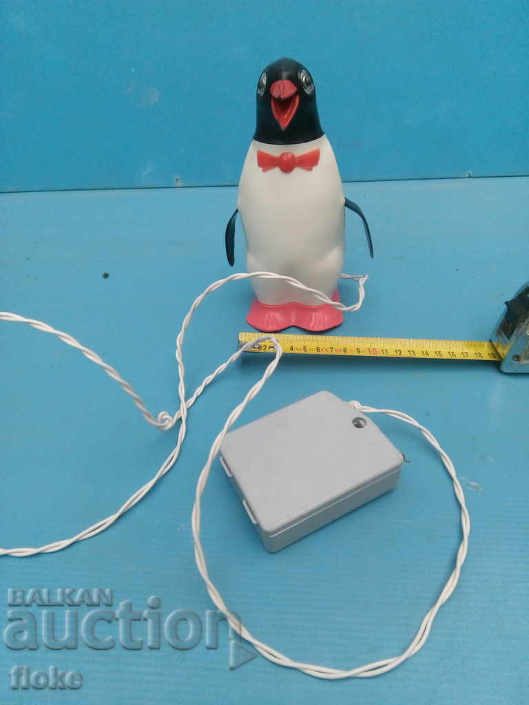 An old mechanical toy penguin