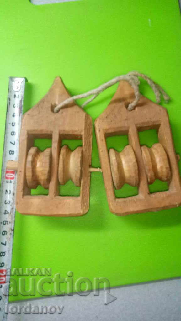 Auction  Old wooden rolls for looming.