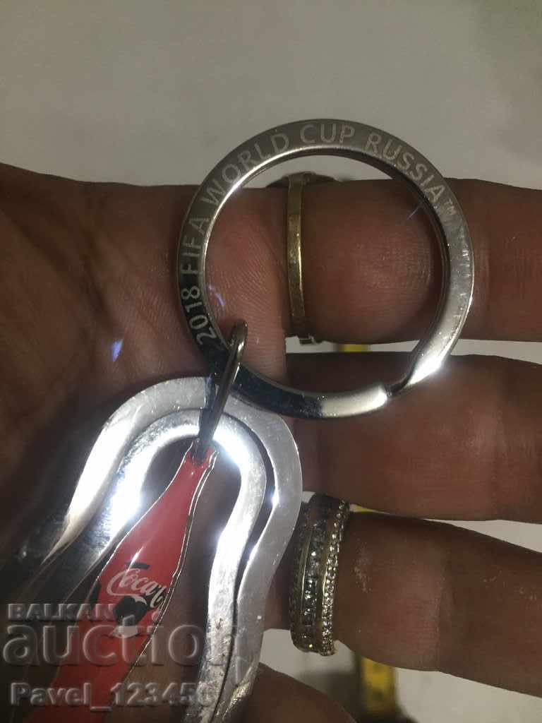 Delivery of Keychain Coca Cola