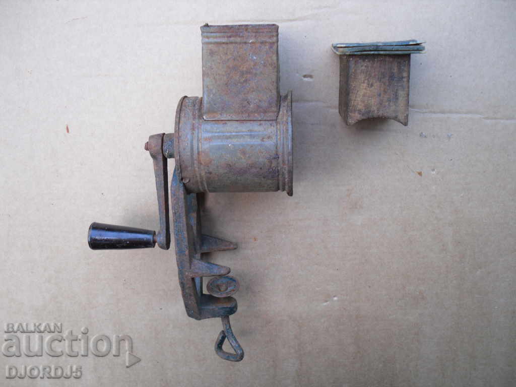 An old machine for grinding spices, marking - 5