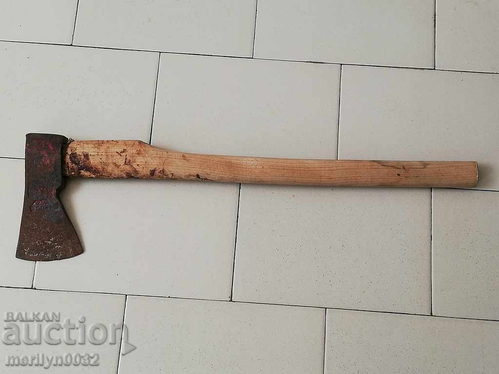 An old ax with a print top gun saber hat grip - 5