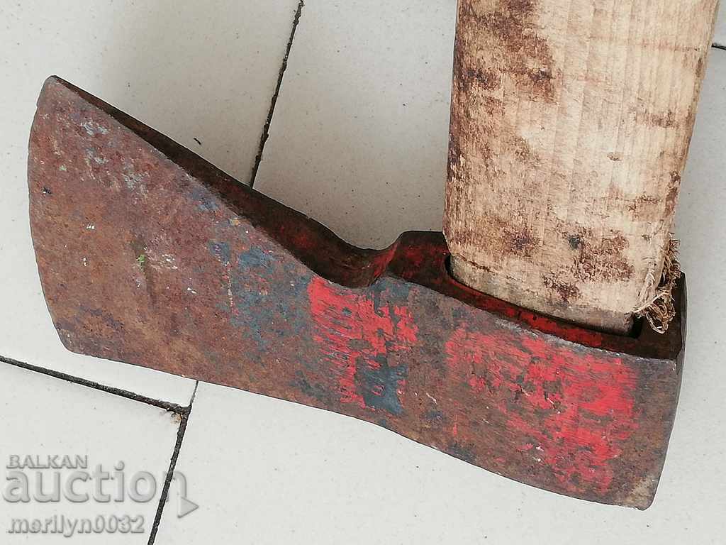 An old ax with a print top gun saber hat grip - 6