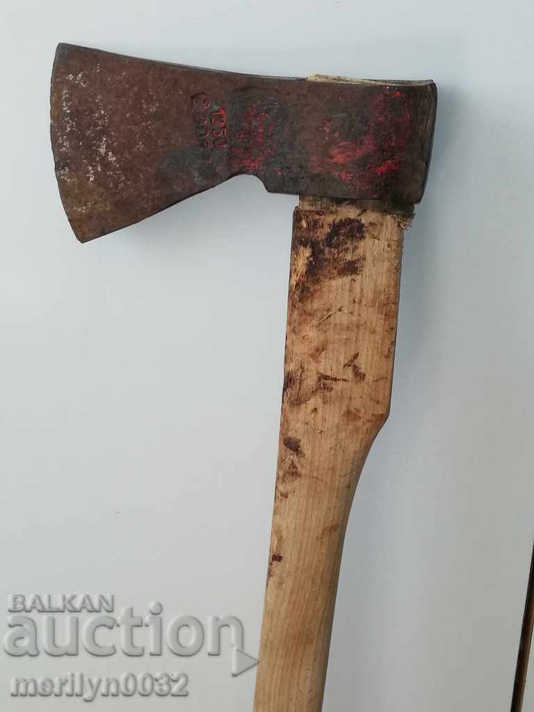 An old ax with a print top gun saber hat grip - 7