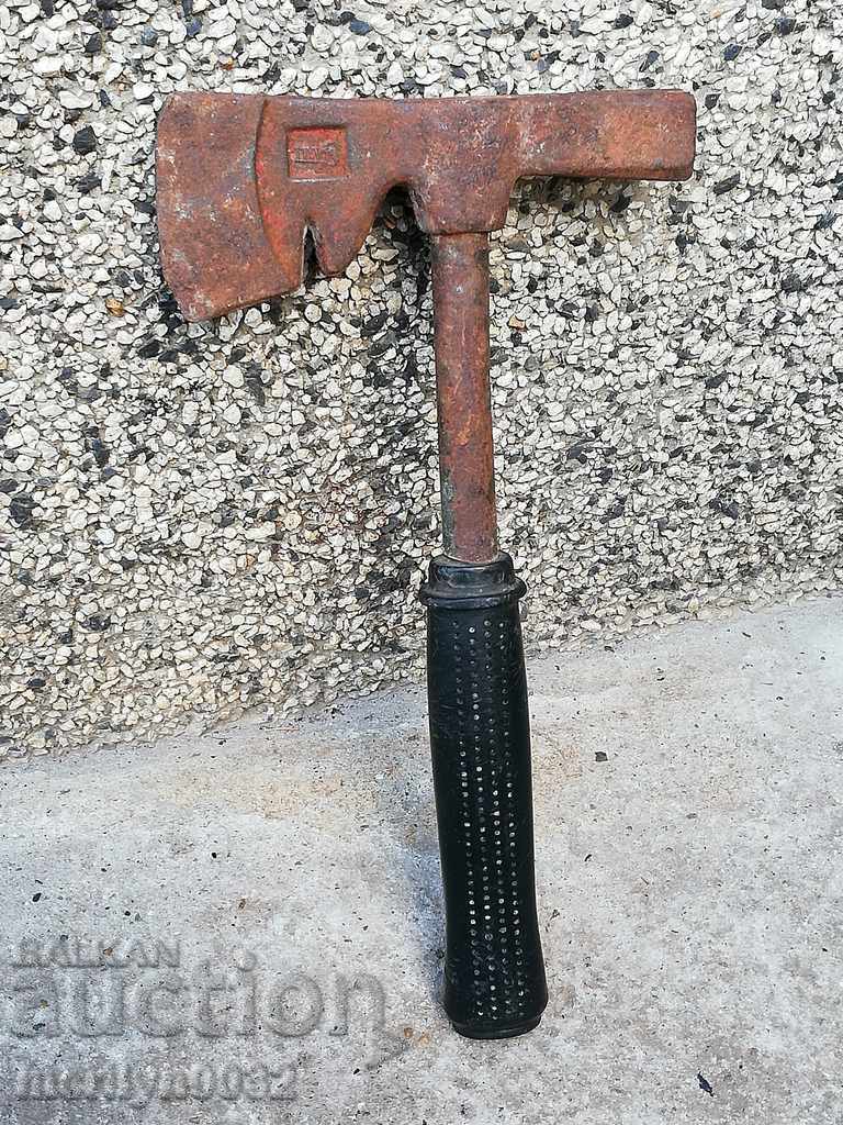 An old ax with a print top gun saber hat grip