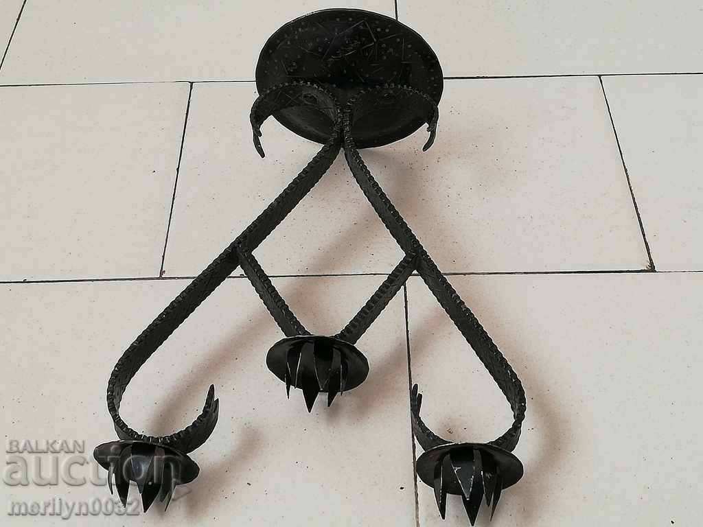 Auction An old forged candlestick from a period period candle Auction An old forged candlestick from a period period candle