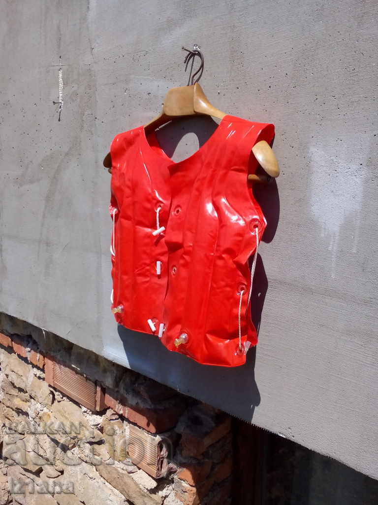 Auction An old swimming jacket Auction An old swimming jacket