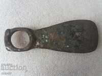Old agricultural tool blade.