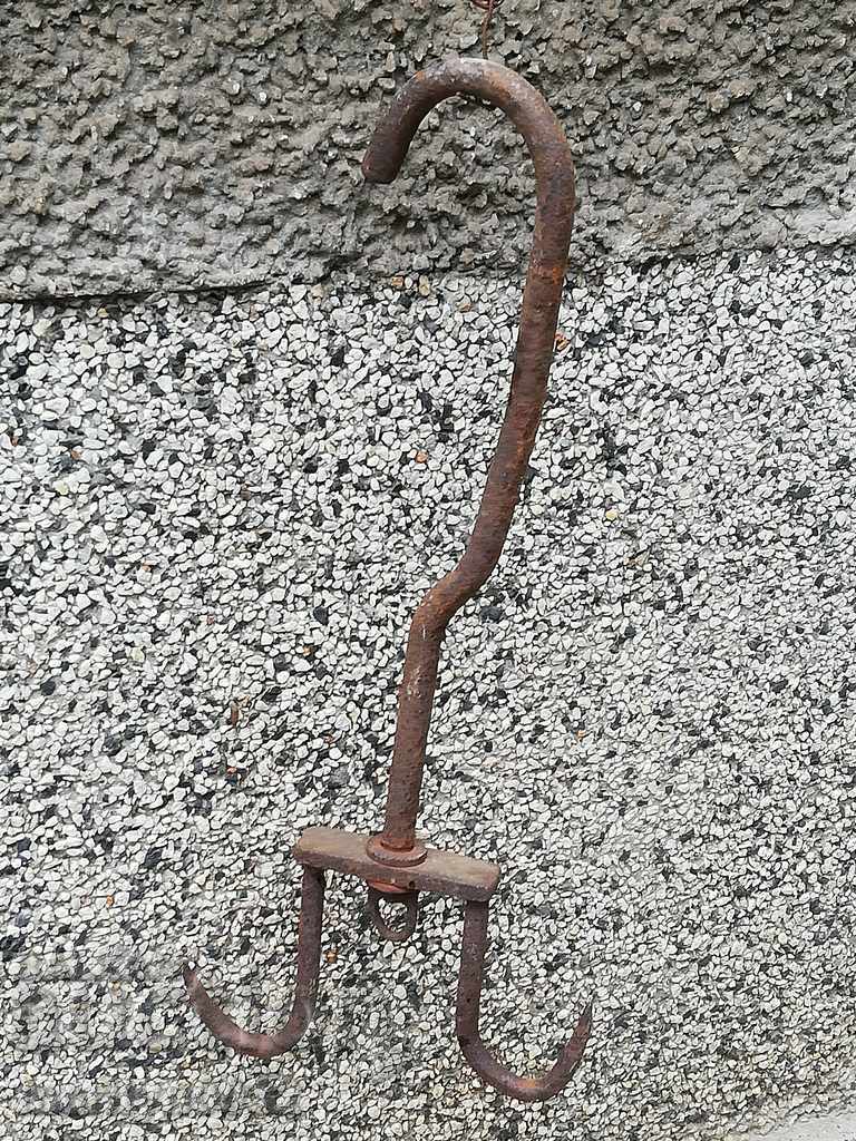 An old forged scraping hook, double twin