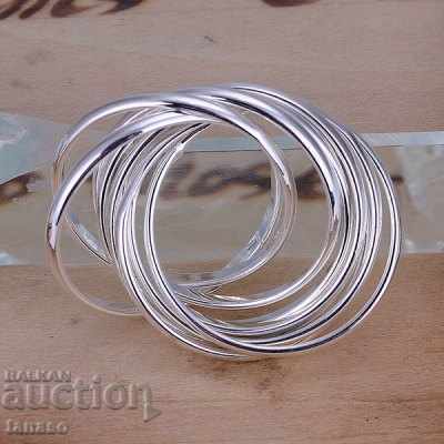 Ring of nine interlocking rings, silver-plated with price € 9.00 | 17.60 BGN