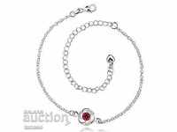 Κομψό βραχιόλι αστραγάλου με κόκκινο ζιργκόν