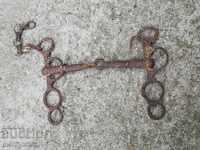 Old forged bridle, wrought iron, harness