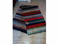 A rug of 2 faces hand-woven 270x75cm.