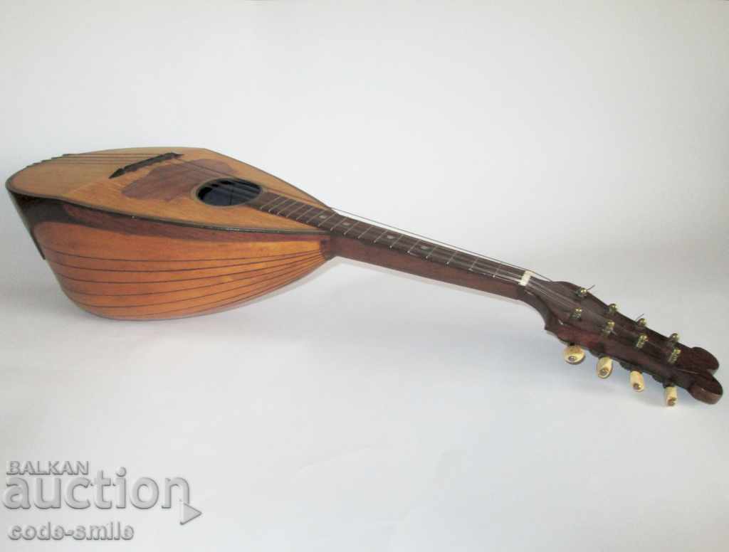 Old ancient Italian mandolin from the end of the 19th century