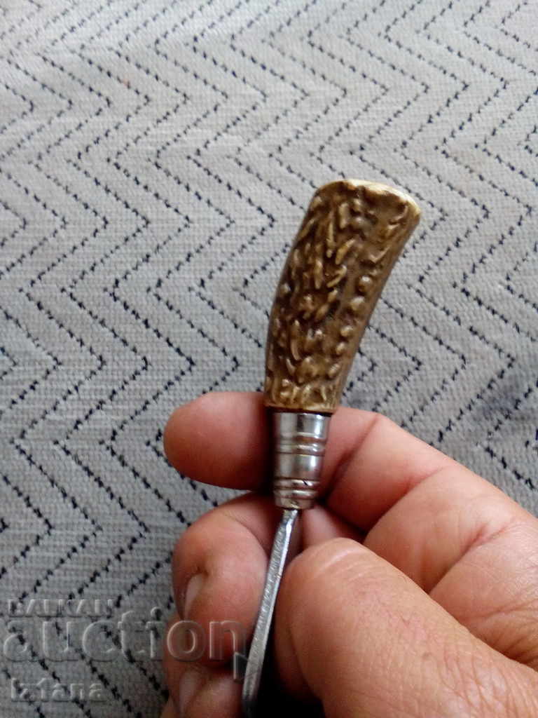 Auction  An old opener