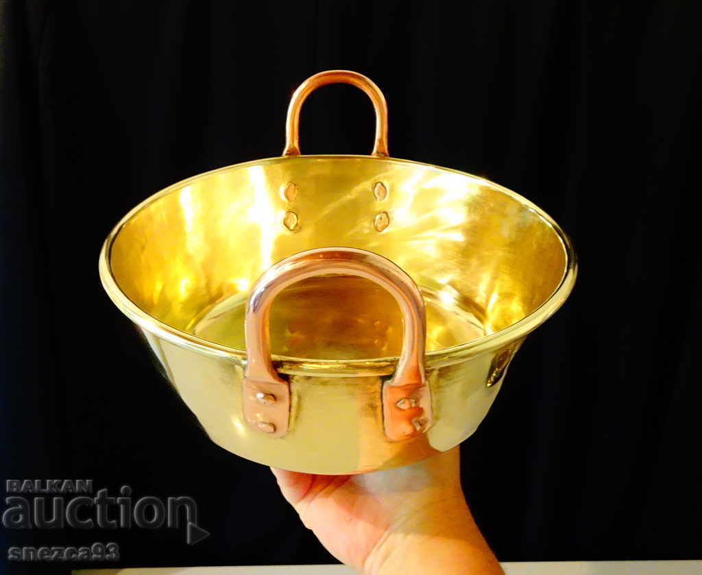 Solid brass pot, pan, tray with copper handles.