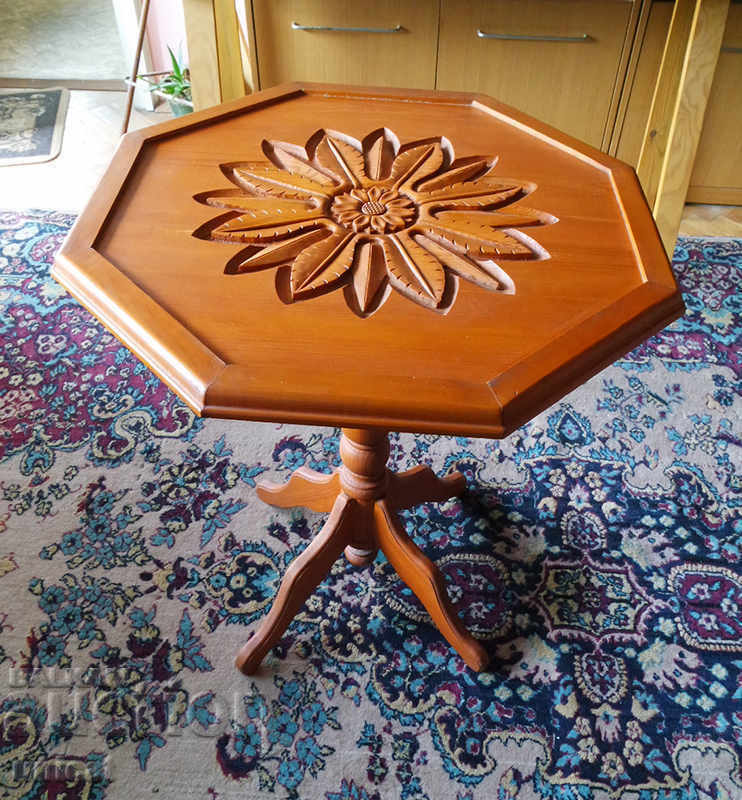 Coffee table with wood carving