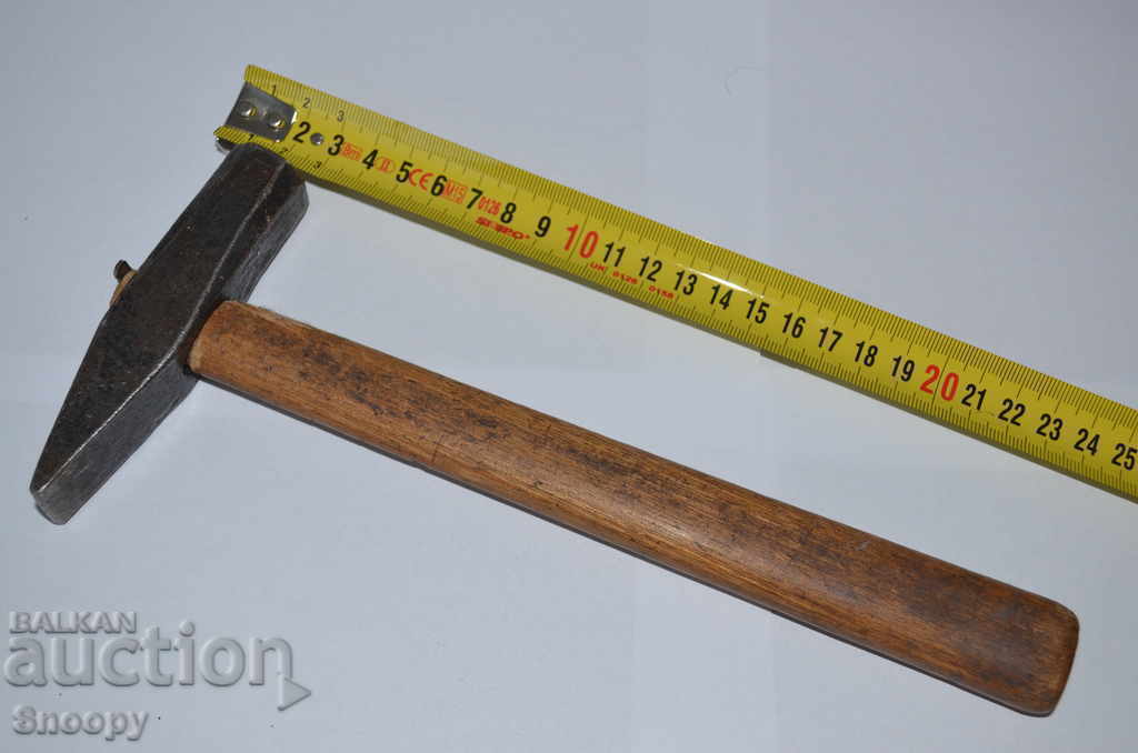 Steel hammer with wooden handle