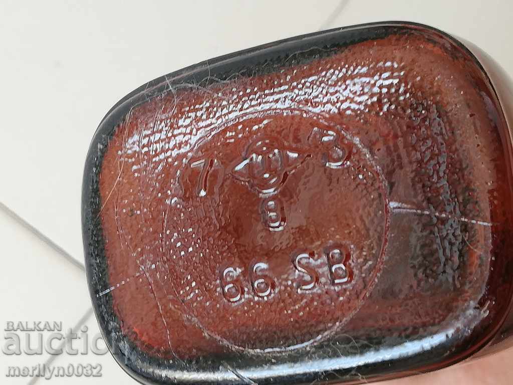 Auction  An old bottle, a bottle, a medicine syrup bottle