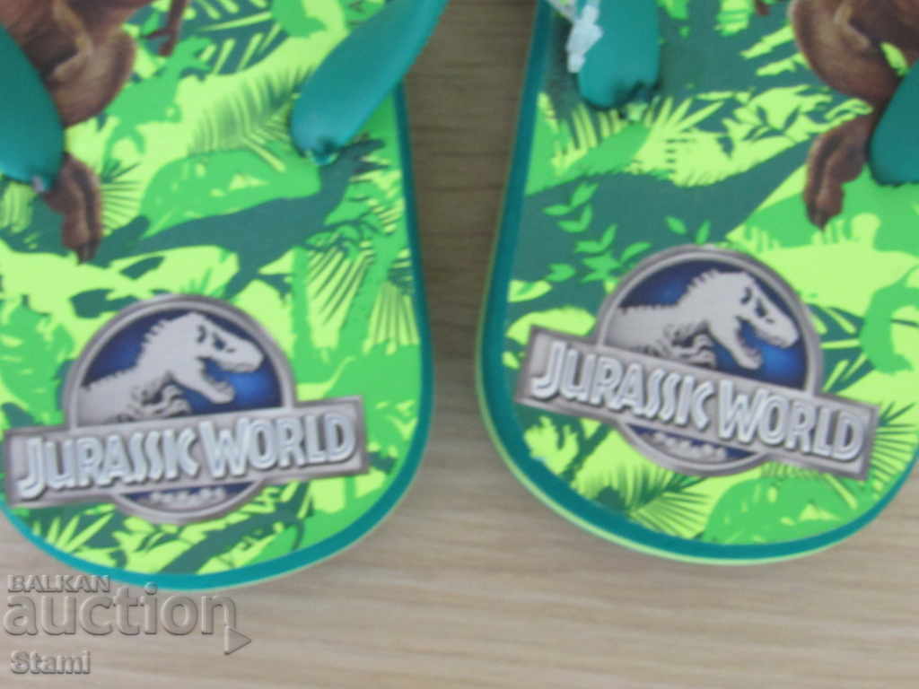 Delivery of New children's flip flops N & M Jurassic Park number 25/27 Delivery of New children's flip flops N & M Jurassic Park number 25/27