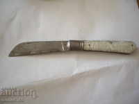 An old knife for kneading with nodding.