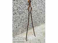 Old dilaf, tongs, wrought iron for oven