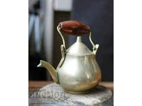 A small old bronze kettle