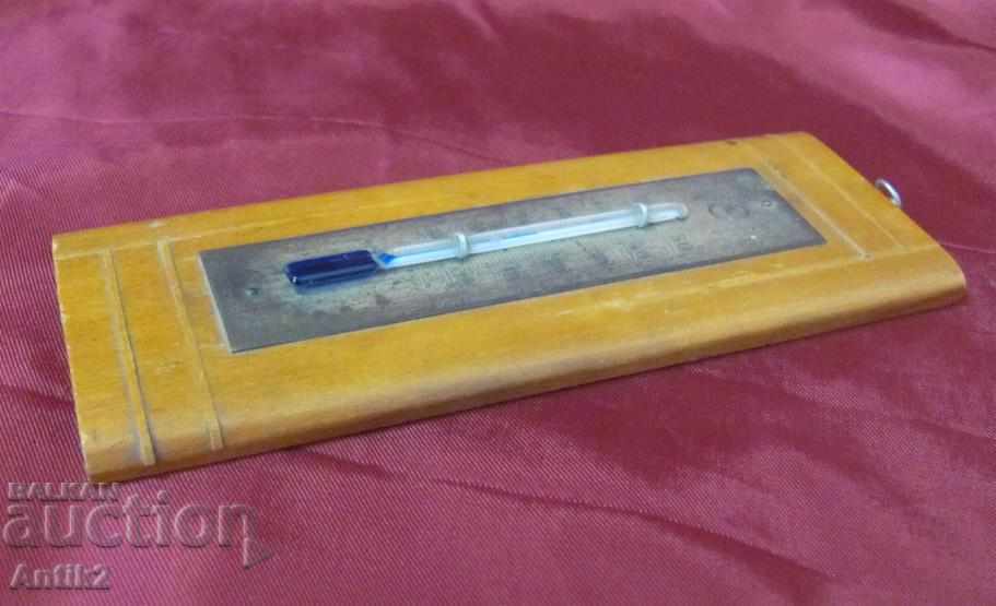 Auction The 30 Star Spearm Thermometer - Bronze and Wood Auction The 30 Star Spearm Thermometer - Bronze and Wood