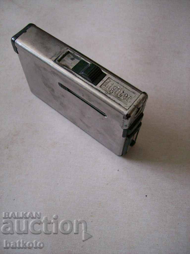 Old automatic cigarette lighter
