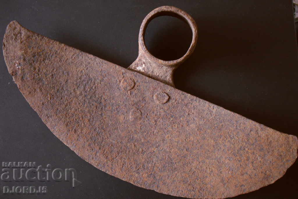 Old forged pick, rivets
