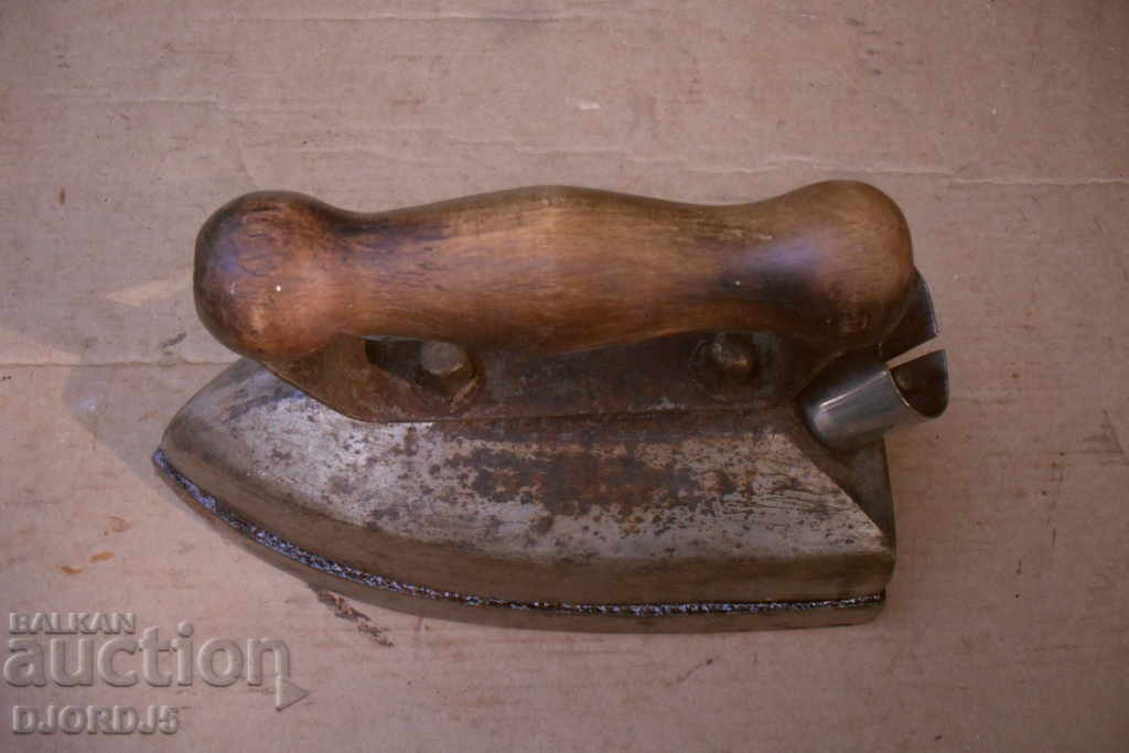 Old iron, wooden handle