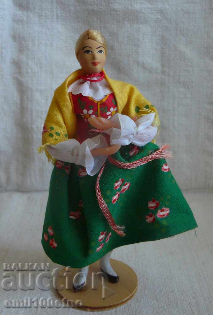 Handcrafted doll in national costume Poland