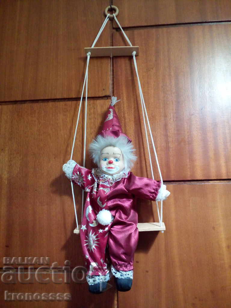 Doll with swing