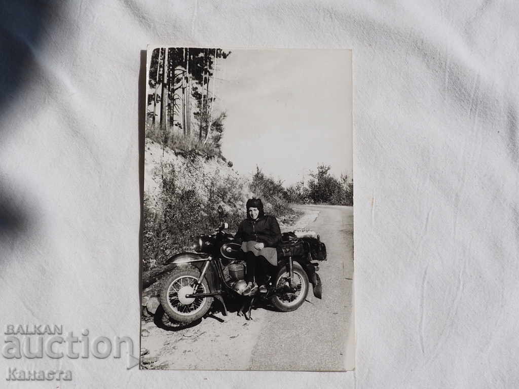 Old picture woman on motor K 244 Н