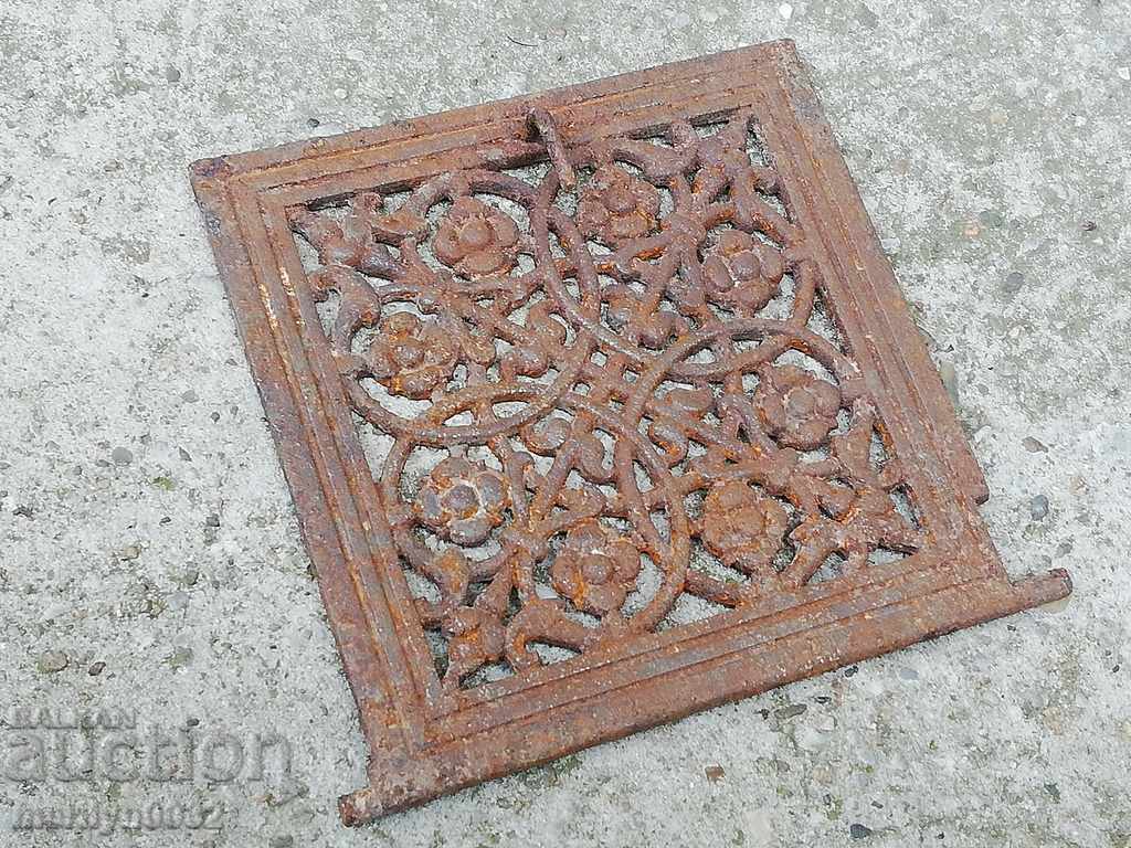 Delivery of Door detail from old Jamal stove, figured cast iron, lid Delivery of Door detail from old Jamal stove, figured cast iron, lid