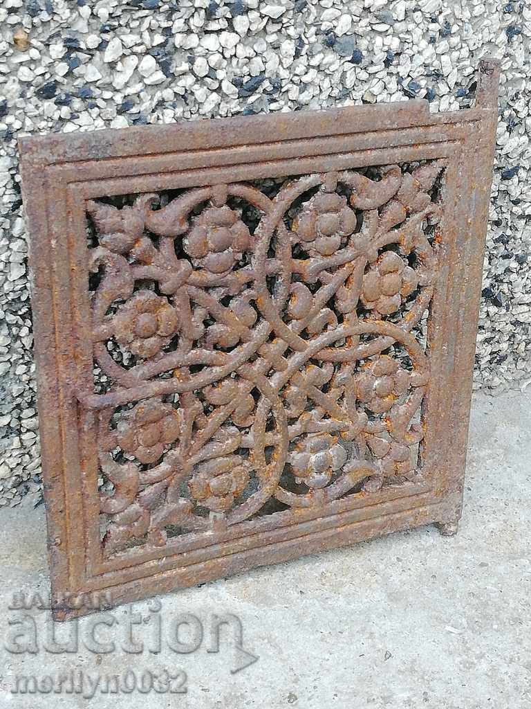 Door detail from old Jamal stove, figured cast iron, lid Door detail from old Jamal stove, figured cast iron, lid