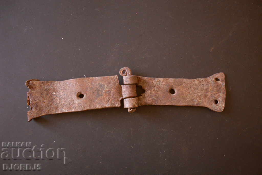 Old forged hinge