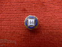 Gold 10k badge marked