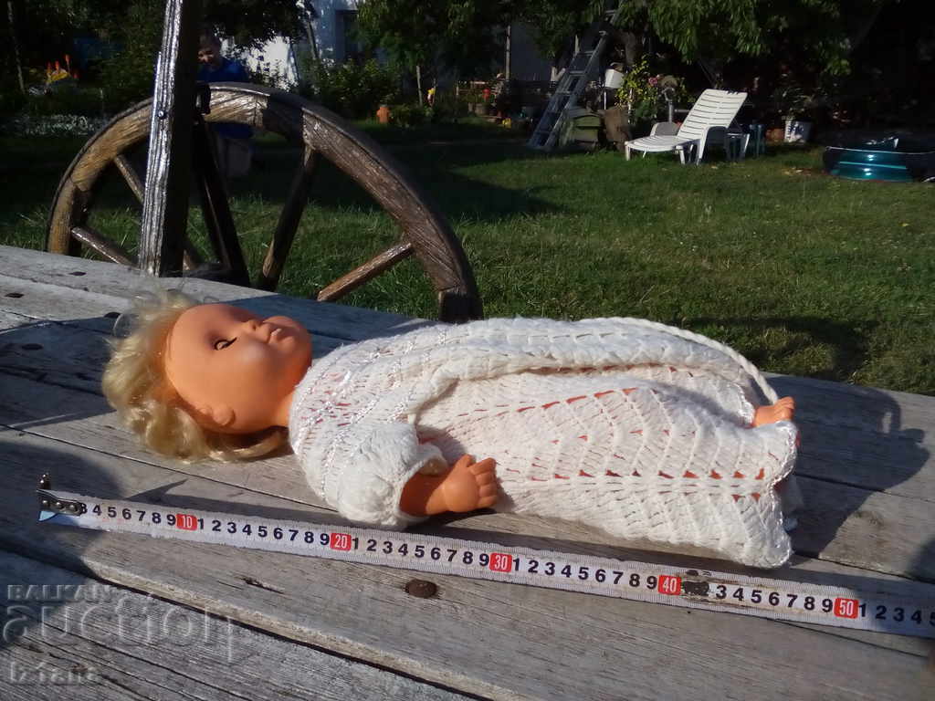 Auction An old doll Auction An old doll