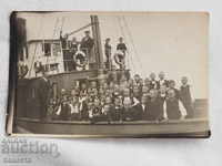 Old photo of children on ship K 245