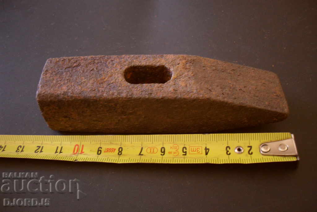 Auction An old hammer Auction An old hammer
