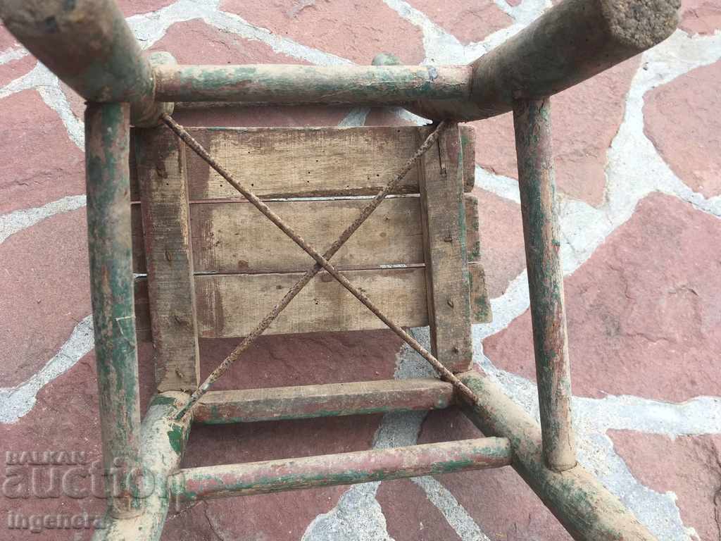 Auction  THE CHAIR IS A SMALL WOOD