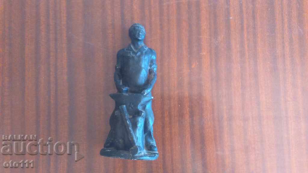 OLD METAL FIGURE, blacksmith's statue