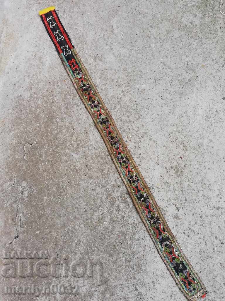 Old hand-woven belt with gold thread from the end of the 19th century, traditional costume