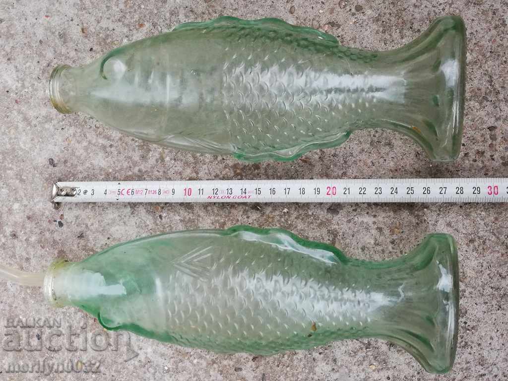 Auction Bottles of fish shaped bottle bottle of olive oil vinegar Auction Bottles of fish shaped bottle bottle of olive oil vinegar